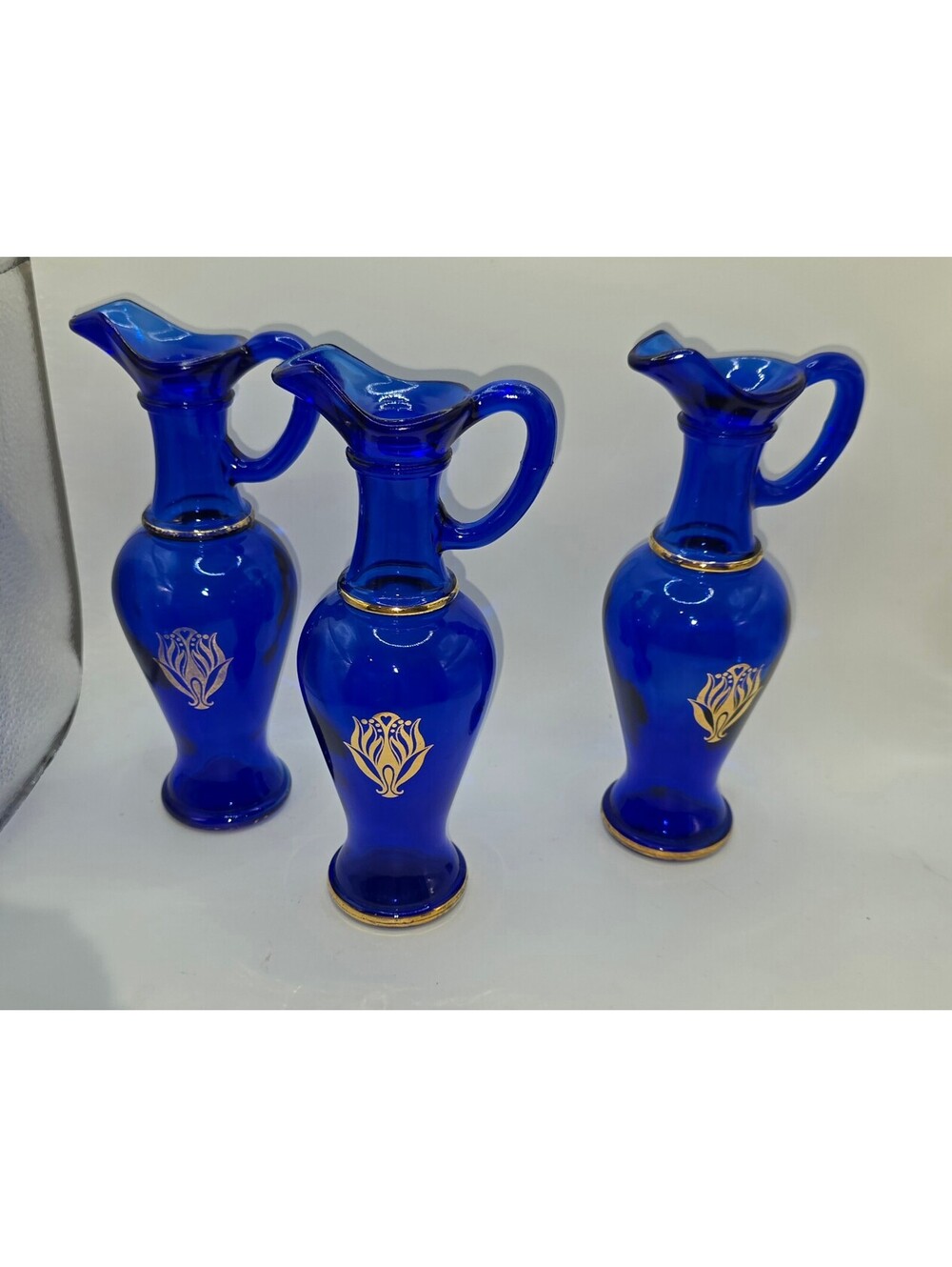 Vintage 1970s Avon "Skin So Soft" Cobalt Blue Pitcher Decanters with Gold Trim